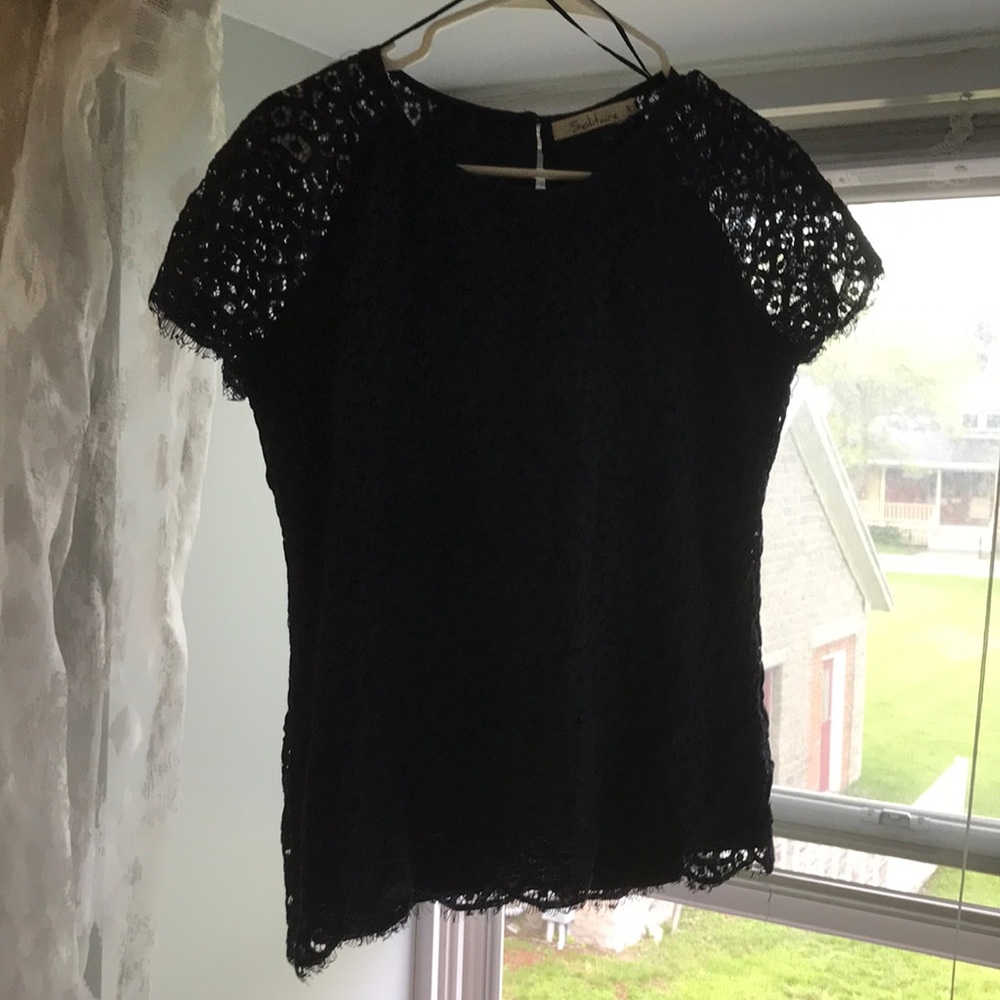 Navy lace top with scalloped details